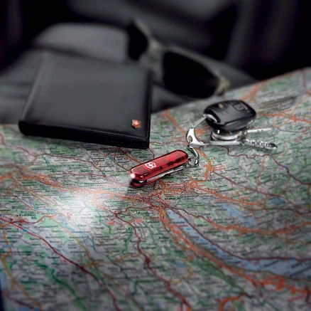 Нож-брелок VICTORINOX Swiss Lite, 58 мм, 7 функций, полупрозрачный красный